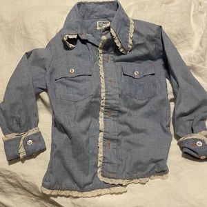 Vintage girls top with ruffle trim and flower on back